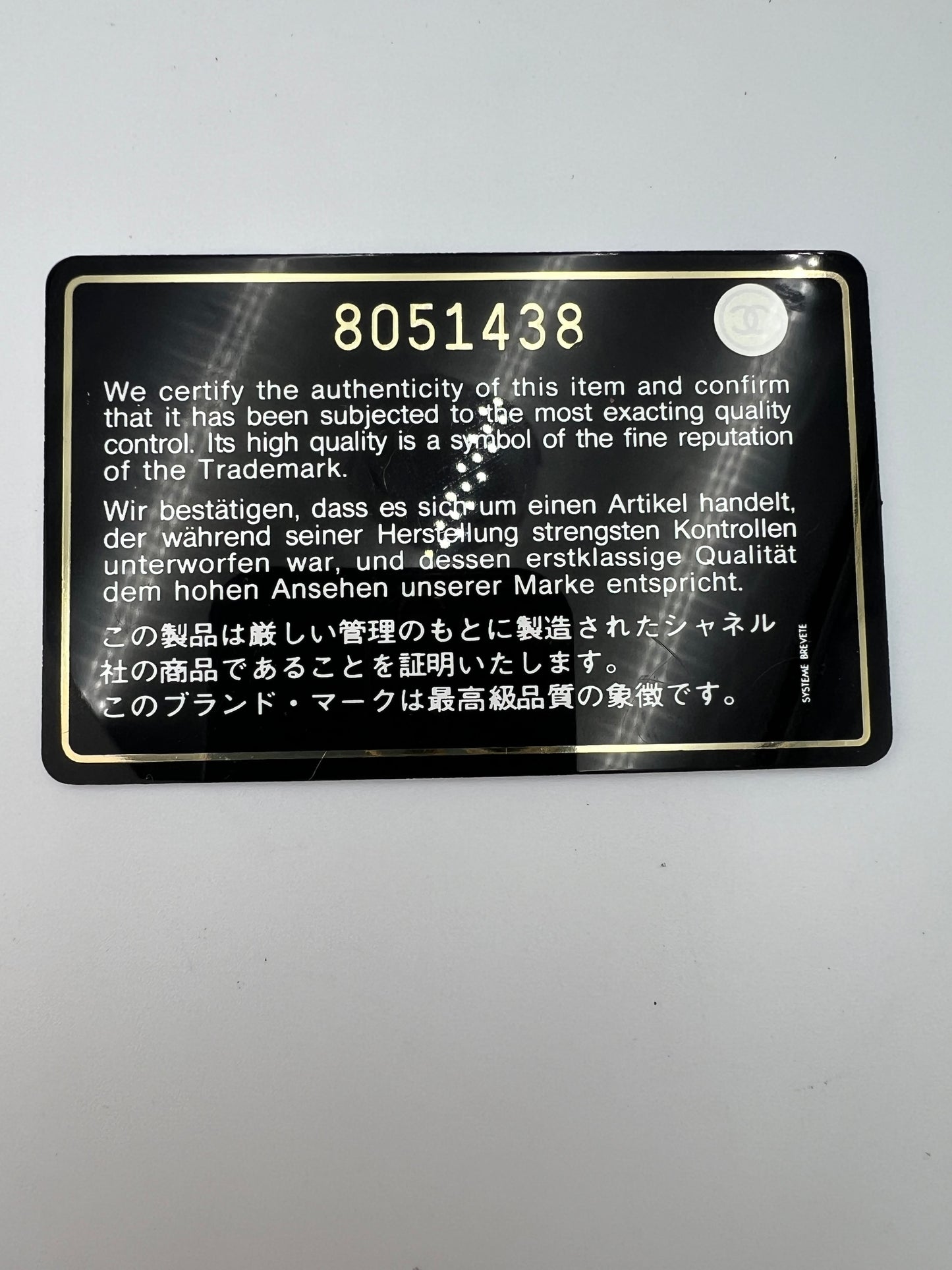 Chanel Camellia Patent Leather